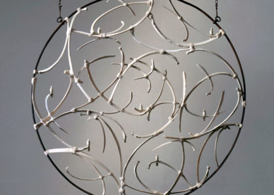 Night Migration, 2003, Rib bones, bone putty, DAS Modeling compound, taxidermied found lizard appendages, steel, twine, acrylic paint, glues, screws, copper, sealants, 44 x 44 x 2 in., height variable